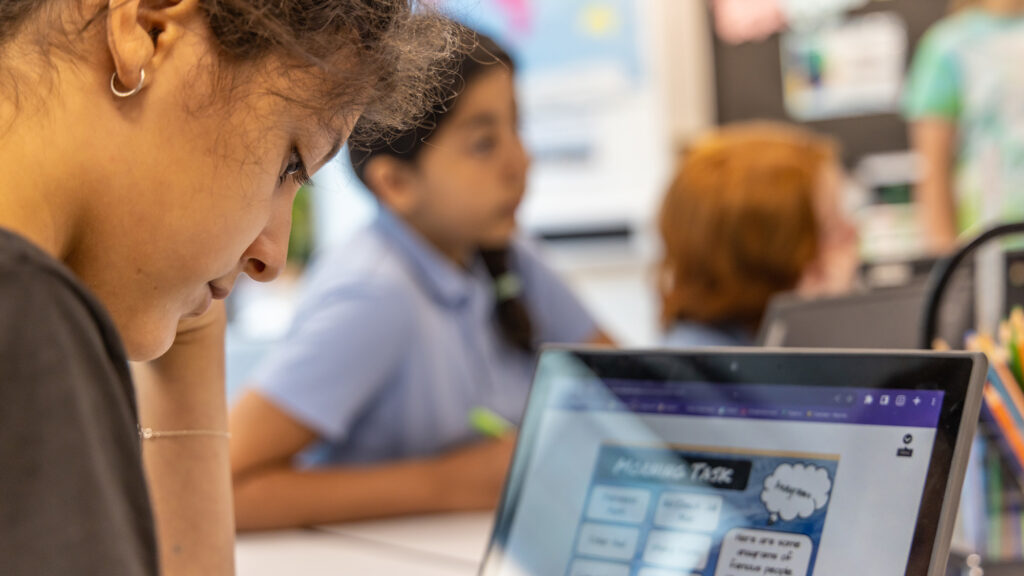 Children learning in classroom at King's Cross Academy Primary School