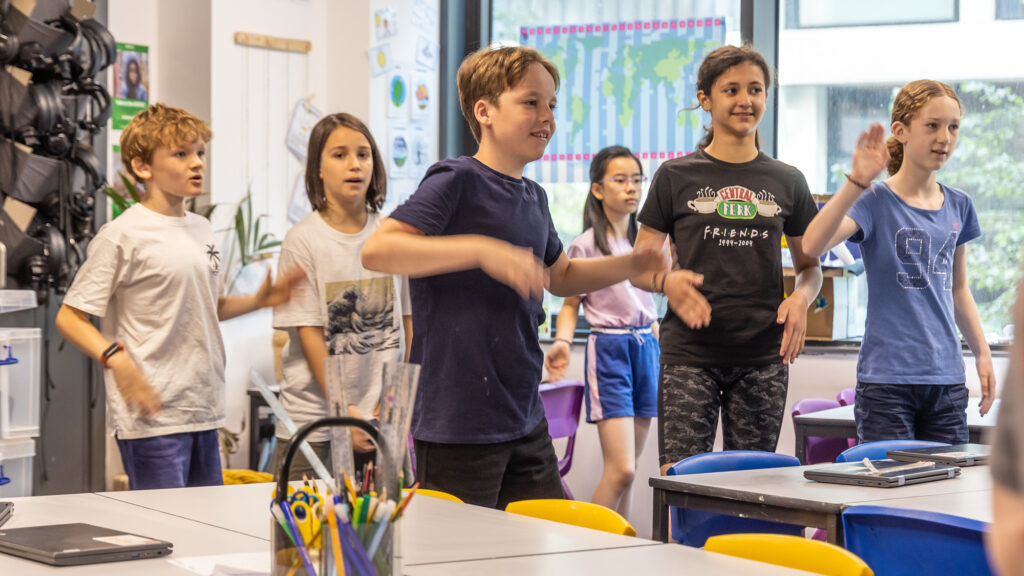 Children in classroom at King's Cross Academy Primary School