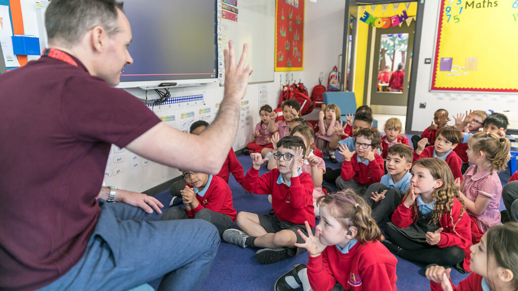 Children in classroom at King's Cross Academy Primary School