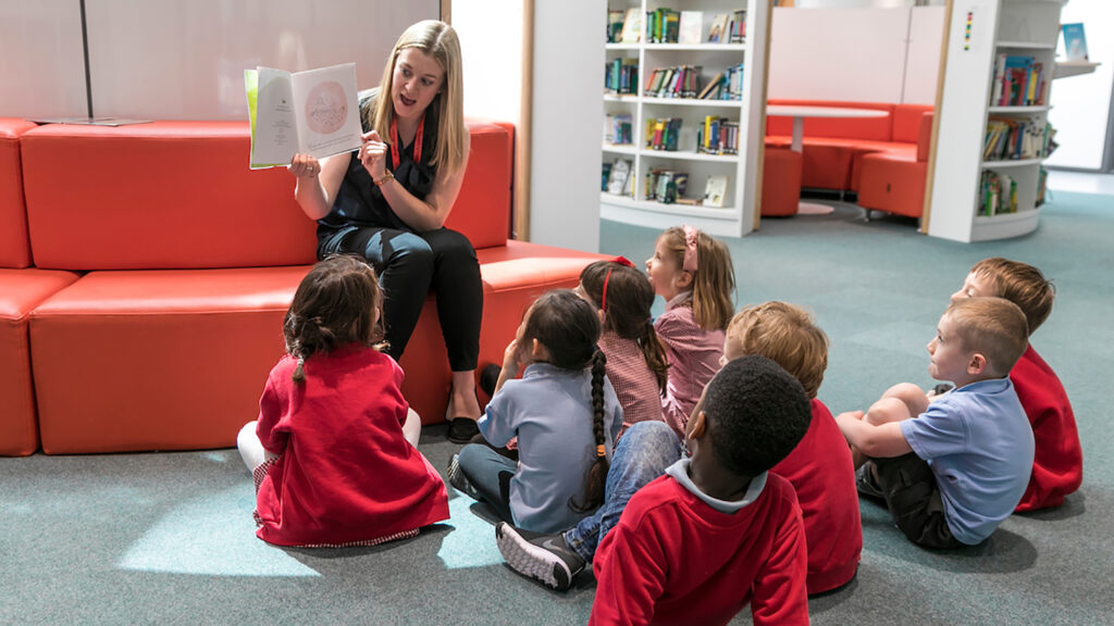 Kids reading at King's Cross Academy Primary School