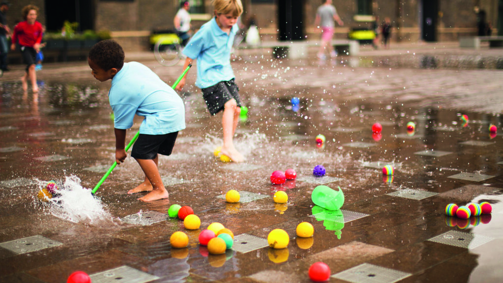 King's Cross Academy children playing in fountains
